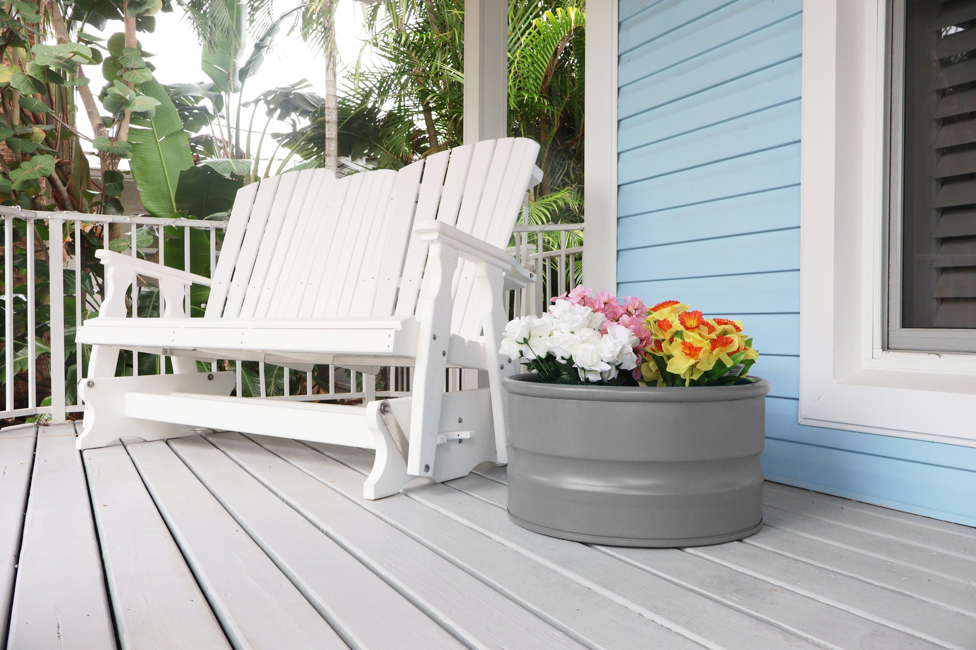 grey planter on porch